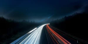highway at night with headlights